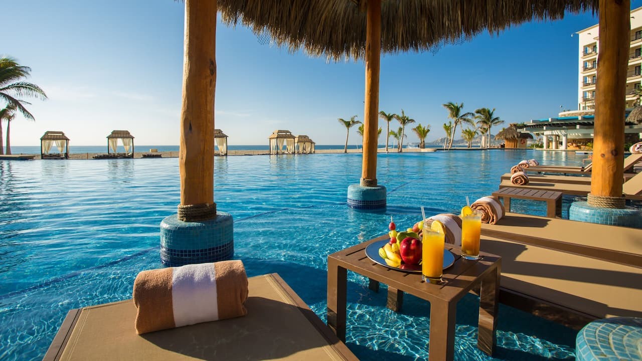 Hyatt-Ziva-Los-Cabos-P164-Drinks-by-Infinity-Pool.16x9