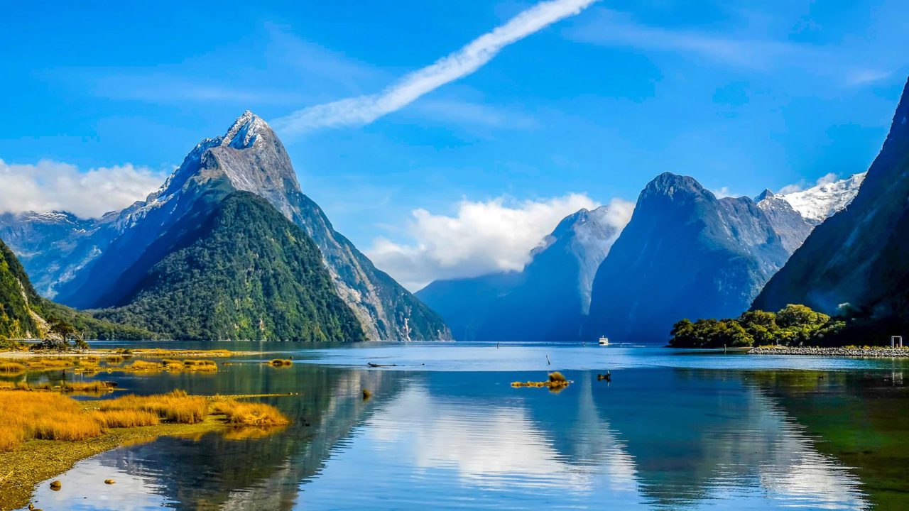 https://travelonica.com/wp-content/uploads/2023/08/Explore-the-stunning-fjords-of-Milford-Sound-1280x720.jpg