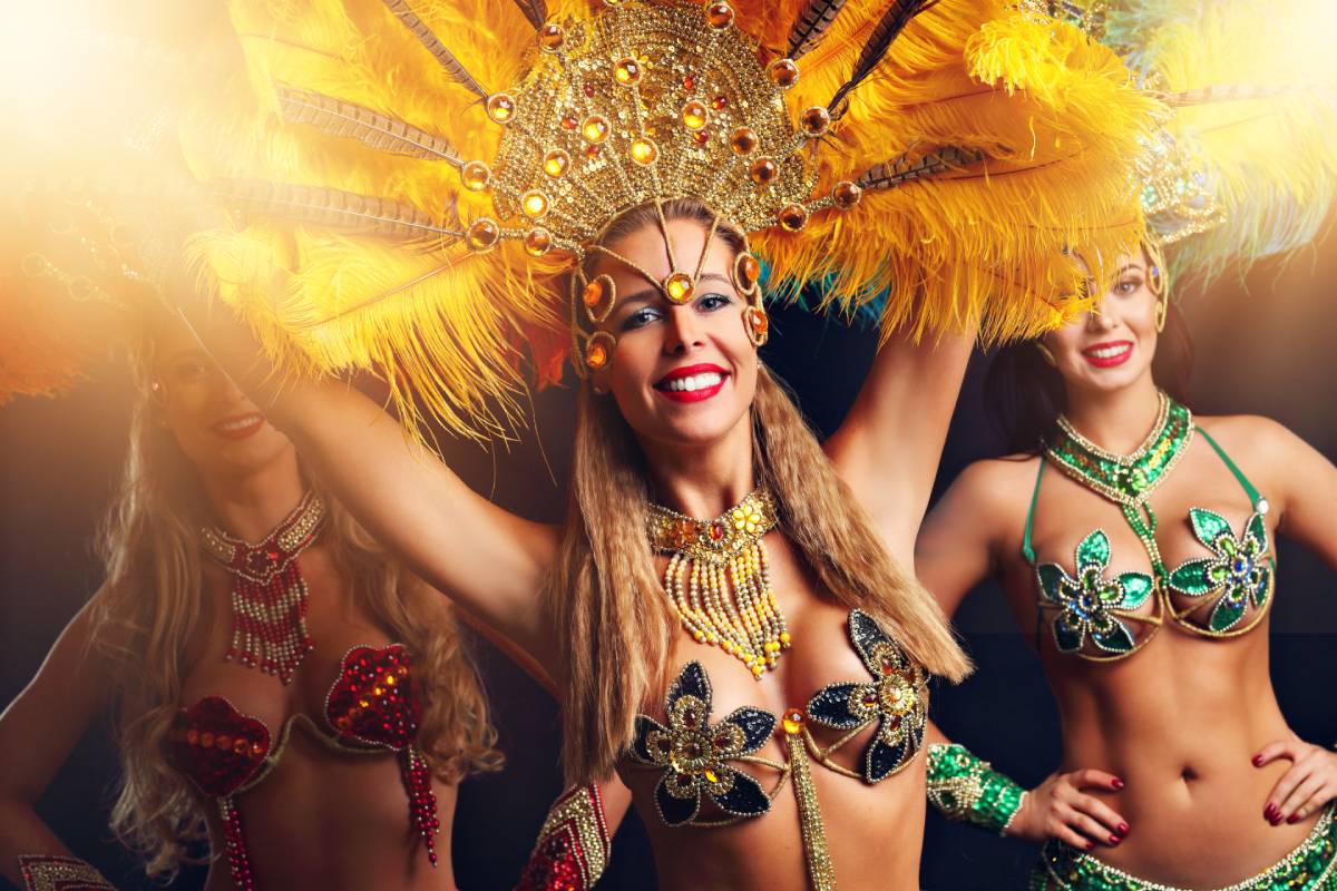 https://travelonica.com/wp-content/uploads/2024/09/brazilian-women-dancing-samba-at-carnival-2023-11-27-04-53-12-utc-1.jpg